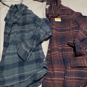 Two women’s carhartt rugged flex shirts medium